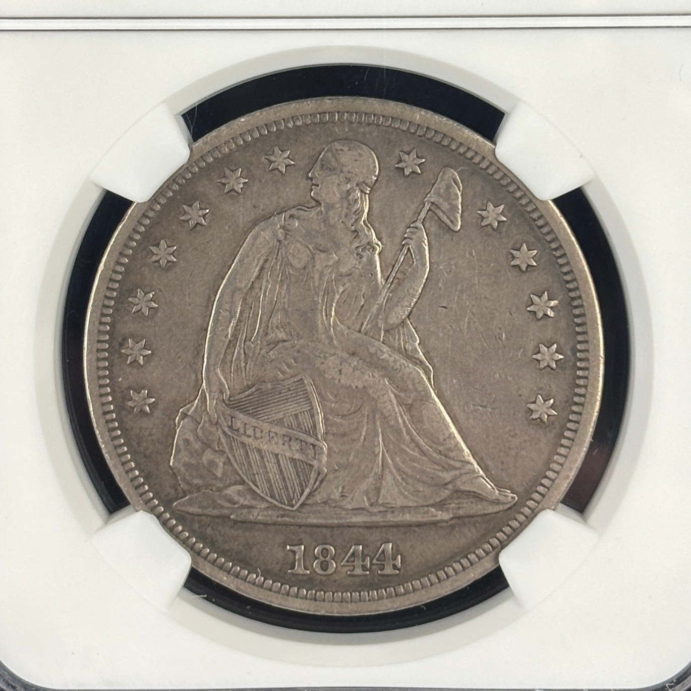 1844 Liberty Seated Dollar NGC XF 40 Original Surfaces